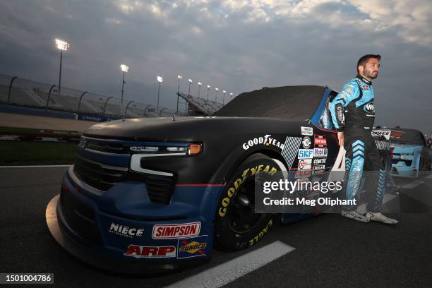 Chase Purdy, driver of the Bama Buggies Chevrolet, waits on the grid prior to the NASCAR Craftsman Truck Series Rackley Roofing 200 at Nashville...