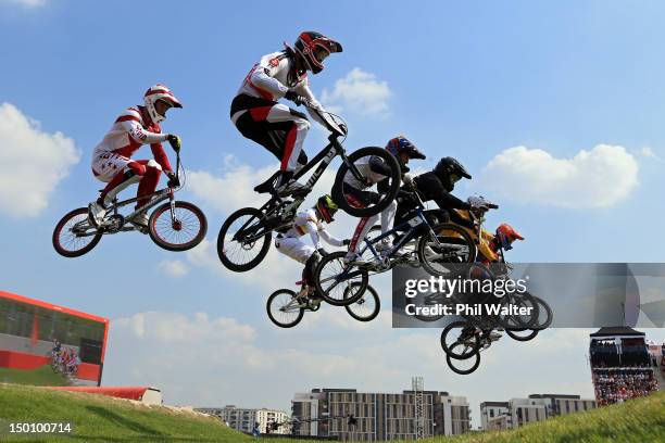 The field clears a jump as they race in the Men's BMX Cycling Semi Finals on Day 14 of the London 2012 Olympic Games at the BMX Track on August 10,...