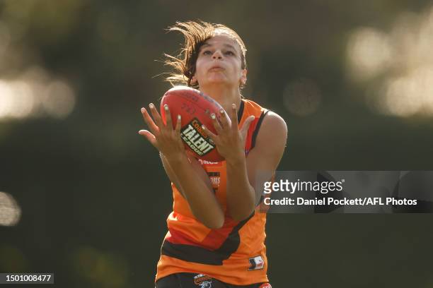 Alannah David of the Cannons marks the ball during the round 11 Coates Talent League Girls match between Eastern Ranges and Calder Cannons at Box...