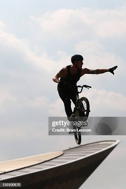 Cyclist performs between races on Day 14 of the London 2012 Olympic Games at BMX Track on August 10, 2012 in London, England.