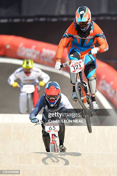 Netherlands' Raymon van der Biezen rides ahead of Britain's Liam Phillips during the men's BMX cycling semi-finals at the London 2012 Olympic Games...