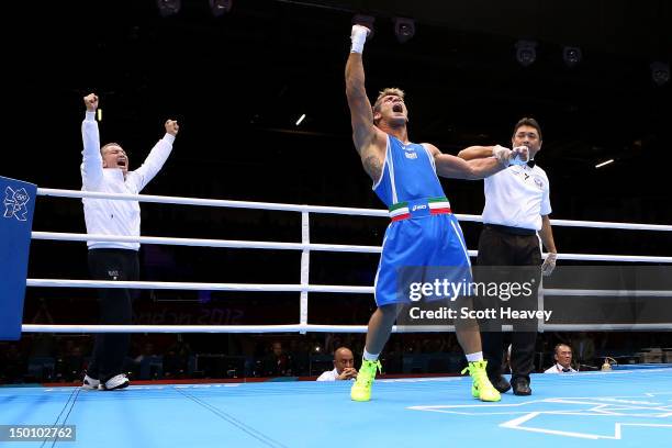 Clemente Russo of Italy reacts after he was declared the winner against Teymur Mammadov of Azerbaijan during the Men's Heavy Boxing bout on Day 14 of...