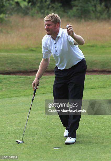 Gareth Wright of West Linton Golf Club celebrates his winning putt on the 18th green during the final day of the Glenmuir PGA Professional...