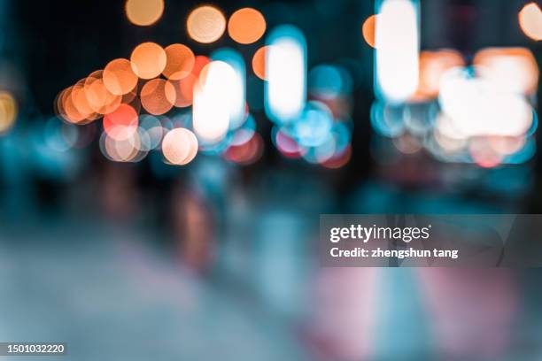 traffic scene of modern city at night. - police lights stock-fotos und bilder