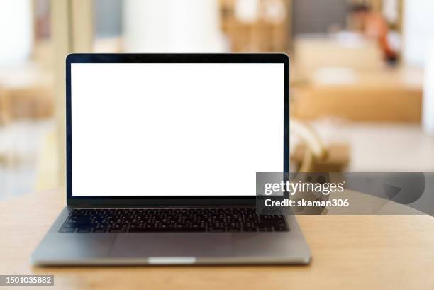 closeup blank screen laptop computer and coffee on wooden table and copyspace - coffee table front view stock pictures, royalty-free photos & images