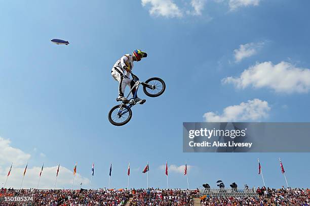 Andres Eduardo Jimenez Caicedo of Colombia races over a jump in the Men's BMX Cycling Semi Finals on Day 14 of the London 2012 Olympic Games at the...