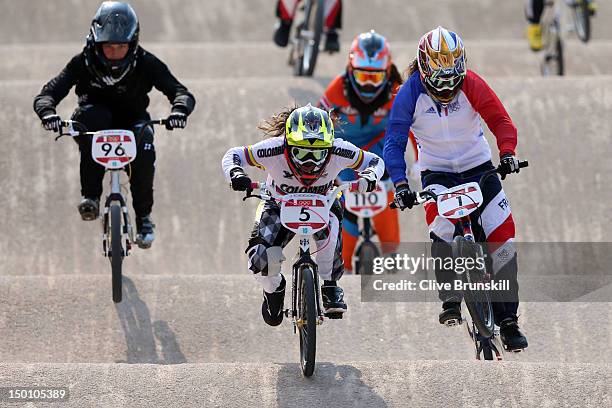 Mariana Pajon of Colombia races over a jump in the Women's BMX Cycling Semi Finals on Day 14 of the London 2012 Olympic Games at the BMX Track on...