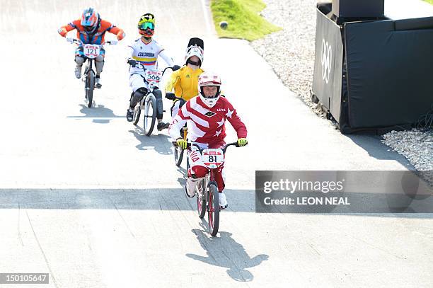 Lativia's Maris Strombergs celebrates taking gold after winning the BMX cycling men's final event at the London 2012 Olympic Games in the Olympic...