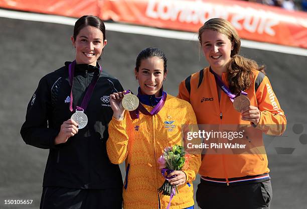 Silver medallist Sarah Walker of New Zealand, Gold medallist Mariana Pajon of Colombia, and Bronze medallist Laura Smulders of the Netherlands...