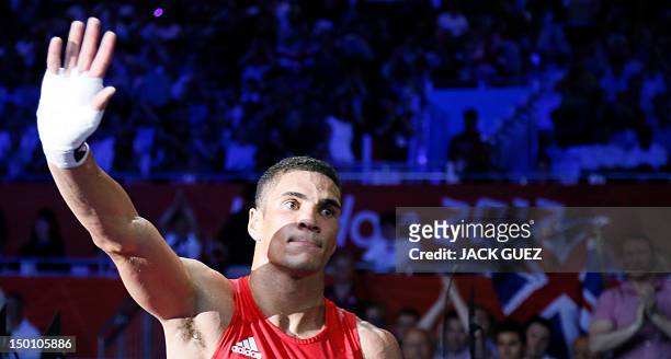 Anthony Ogogo of Great Britain departs the ring following his loss to Esquiva Falcao Florentino of Brazil in the men's Middleweight boxing...