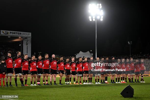 The Crusaders sing the national anthem during the Super Rugby Pacific Final match between Chiefs and Crusaders at FMG Stadium Waikato, on June 24 in...