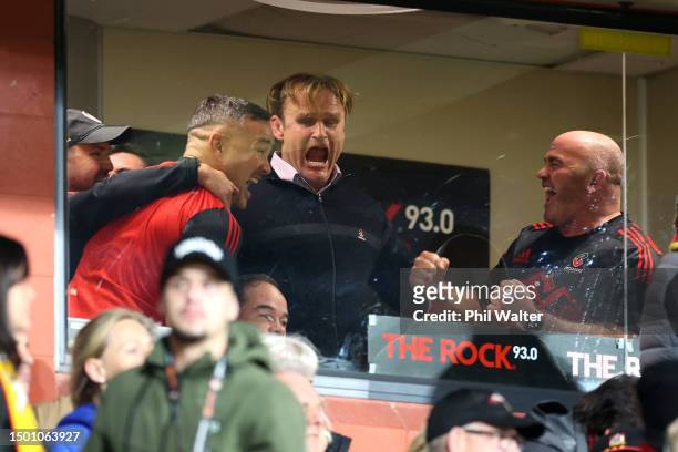 The Crusaders coaching team celebrates after winning the Super Rugby Pacific Final match between Chiefs and Crusaders at FMG Stadium Waikato, on June...