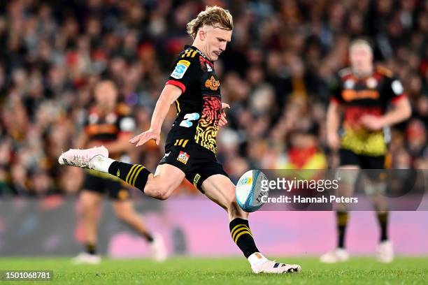 Damian McKenzie of the Chiefs kicks the ball during the Super Rugby Pacific Final match between Chiefs and Crusaders at FMG Stadium Waikato, on June...