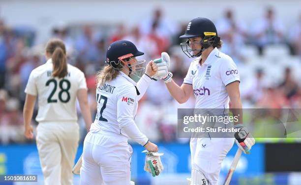 England batter Natalie Sciver-Brunt reaches her half century and is congratulated by Tammy Beaumont during day three of the LV= Insurance Women's...