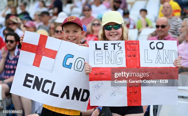 Spectators pose for a photo from the crowd during day three of the LV= Insurance Women's Ashes Test match between England and Australia at Trent...