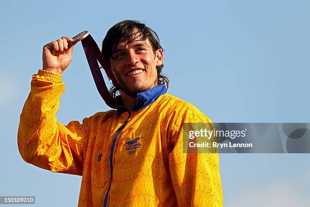 Bronze medallist Carlos Mario Oquendo Zabala of Colombia celebrate during the medal ceremony for the Men's BMX Cycling Final on Day 14 of the London...