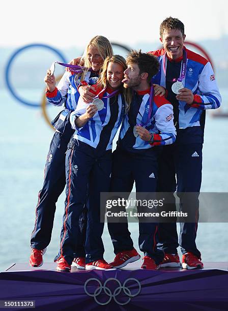 Women's sailors Saskia Clark and Hannah Mills of Great Britain and 470 Men's sailors Luke Patience and Stuart Bithell of Great Britain celebrate...