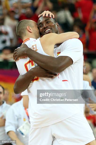 Serge Ibaka and Sergio Rodriguez of Spain celebrate after they won 67-59 against Russia during the Men's Basketball semifinal match on Day 14 of the...