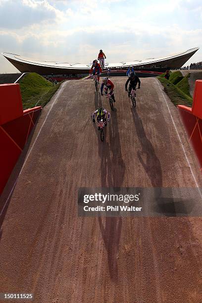 The field race under a ramp in the Women's BMX Cycling Semi Finals on Day 14 of the London 2012 Olympic Games at the BMX Track on August 10, 2012 in...