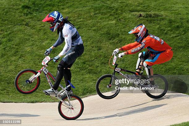 Liam Phillips of Great Britain and Raymon Van Der Biezen of Netherlands compete in the Men's BMX Cycling Semi Finals on Day 14 of the London 2012...