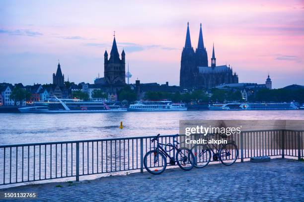 sunset view of cologne skyline - köln skyline stock pictures, royalty-free photos & images