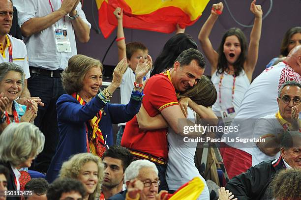 Queen Sofia, Prince Felipe and Princess Letizia of Spain celebrate during the Men's Basketball semifinal match between Spain and Russia on Day 14 of...