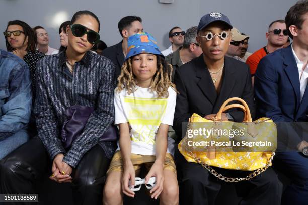 Helen Lasichanh, Rocket Williams and Pharrell Williams attend the Loewe Menswear Spring/Summer 2024 show as part of Paris Fashion Week on June 24,...