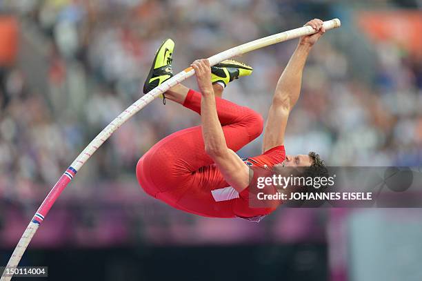 Brad Walker competes in the men's pole vault final at the athletics event of the London 2012 Olympic Games on August 10, 2012 in London. AFP PHOTO /...