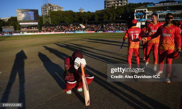 Akeal Hosein of West Indies cuts a dejected figure following the ICC Men's Cricket World Cup Qualifier Zimbabwe 2023 match between Zimbabwe and West...