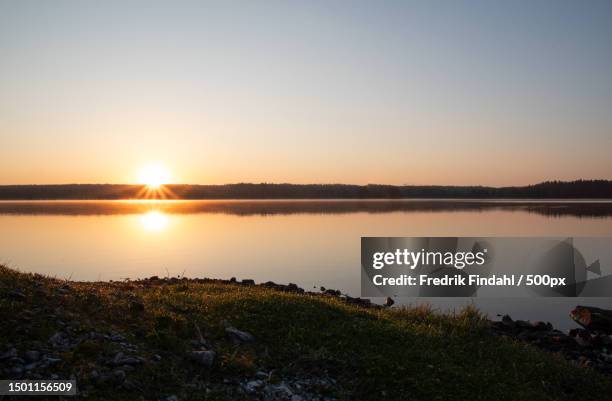 scenic view of lake against clear sky during sunset,sweden - sverige landskap stock pictures, royalty-free photos & images