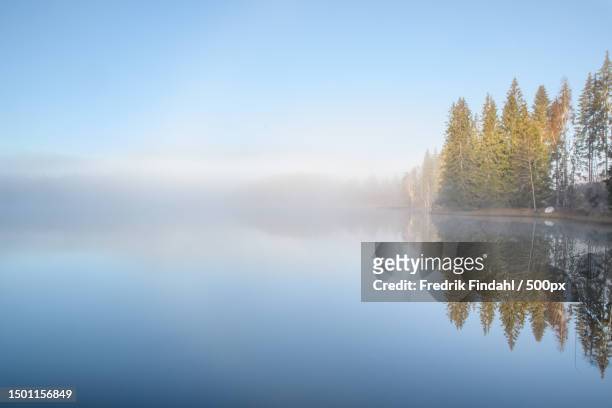 scenic view of lake against sky during winter,sweden - sverige landskap stock pictures, royalty-free photos & images