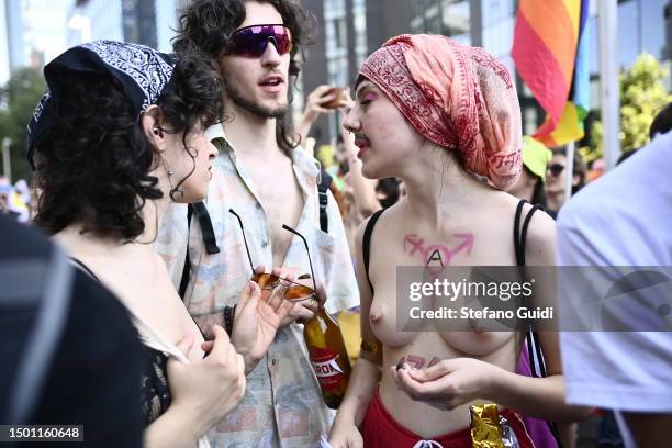 People participate in the Milano Pride 2023 on June 24, 2023 in Milan, Italy. The Milan 2023 Pride show is the culmination of this year's Pride...