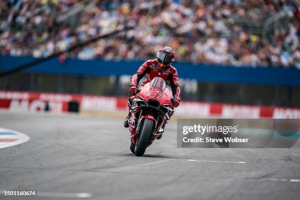 Augusto Fernandez of Spain and Tech3 GASGAS Factory Racing rolls into the starting grid during the Sprint of the MotoGP Motul TT Assen at TT Circuit...