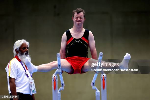 Paul Clucas of Isla of Man competes at the Parallel Bars during the Gymnastic competition at Messe Berlin on day eight of the Special Olympics World...