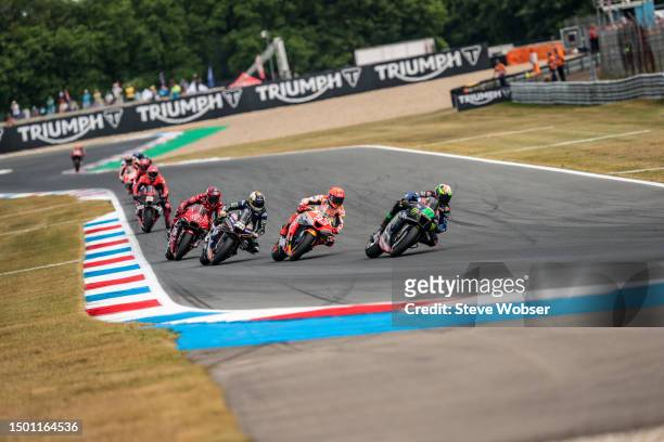 Franco Morbidelli of Italy and Monster Energy Yamaha MotoGP rides in front of Marc Marquez of Spain and Repsol Honda Team, Raul Fernandez of Spain...