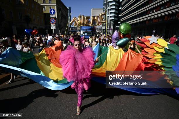 People participate in the Milano Pride 2023 on June 24, 2023 in Milan, Italy. The Milan 2023 Pride show is the culmination of this year's Pride...