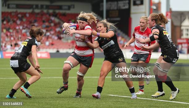 Sam Monaghan of Gloucester-Hartpury goes past Gabby Cantora during the Women's Allianz Premier 15s Final between Gloucester-Hartpury and Exeter...