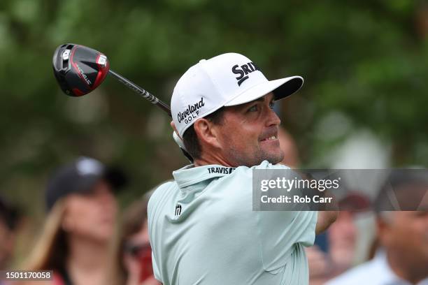 Keegan Bradley of the United States plays his shot from the first tee during the third round of the Travelers Championship at TPC River Highlands on...