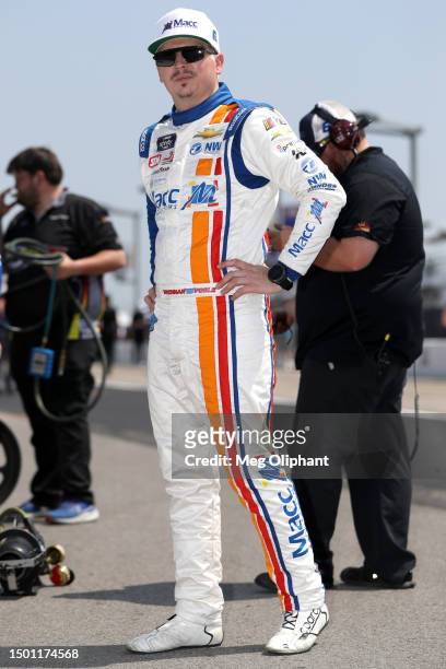 Brennan Poole, driver of the Macc Door Systems Chevrolet, waits on the grid during qualifying for the NASCAR Xfinity Series Tennessee Lottery 250 at...