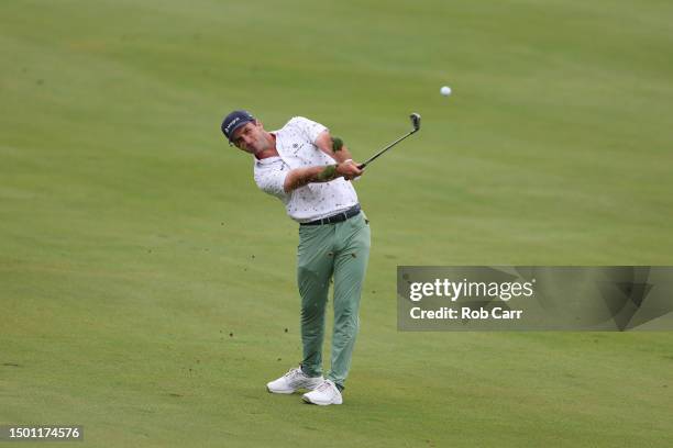 Denny McCarthy of the United States plays a second shot on the first hole during the third round of the Travelers Championship at TPC River Highlands...