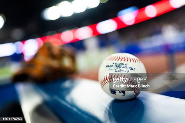 An official Rawlings Major League Baseball with a MLB logo is seen before the Toronto Blue Jays play the Oakland Athletics in their MLB game at the...