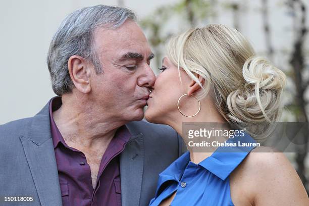 Singer Neil Diamond and wife Katie McNeil Diamond attend his Hollywood Walk of Fame ceremony on August 10, 2012 in Hollywood, California.