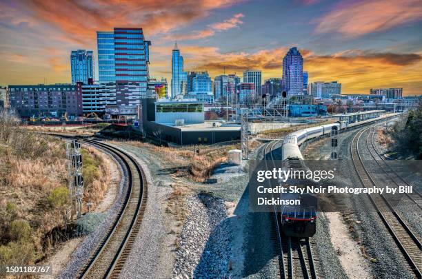 raleigh nc skyline and train - raleigh stock pictures, royalty-free photos & images