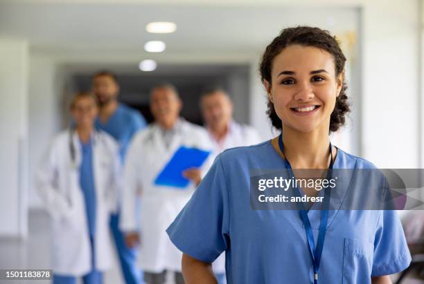 happy nurse working at a hospital - civil imagens e fotografias de stock