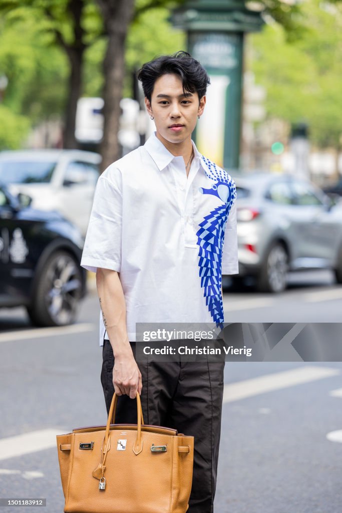 Mai Chieh Sun wears white button shirt, brown bag outside Hermes News  Photo - Getty Images