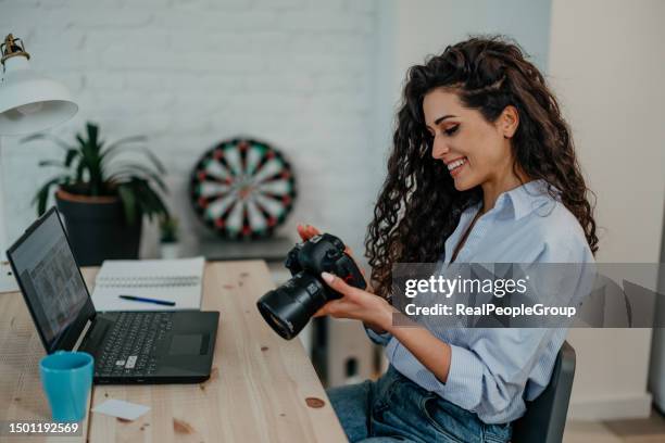 loving my last photoshoot - average photo editing by professional photographers stock pictures, royalty-free photos & images