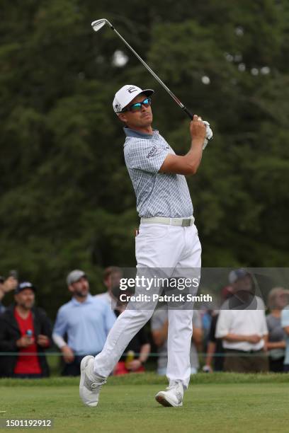 Rickie Fowler of the United States plays his shot from the fifth tee during the third round of the Travelers Championship at TPC River Highlands on...