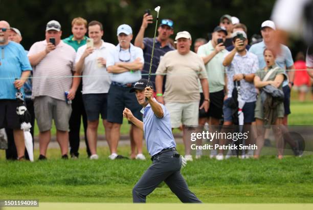 Justin Thomas of the United States reacts to his chip on the fourth green during the third round of the Travelers Championship at TPC River Highlands...