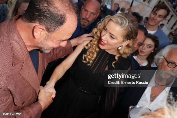 Barrett Wissman and Amber Heard are seen during the 69th Taormina Film Festival on June 24, 2023 in Taormina, Italy.