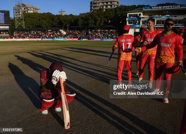 Akeal Hosein of West Indies cuts a dejected figure following the ICC Men's Cricket World Cup Qualifier Zimbabwe 2023 match between Zimbabwe and West...